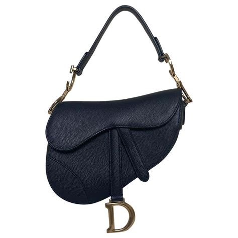 Mini Saddle Bag Black Grained Calfskin with Contrast Stitching.